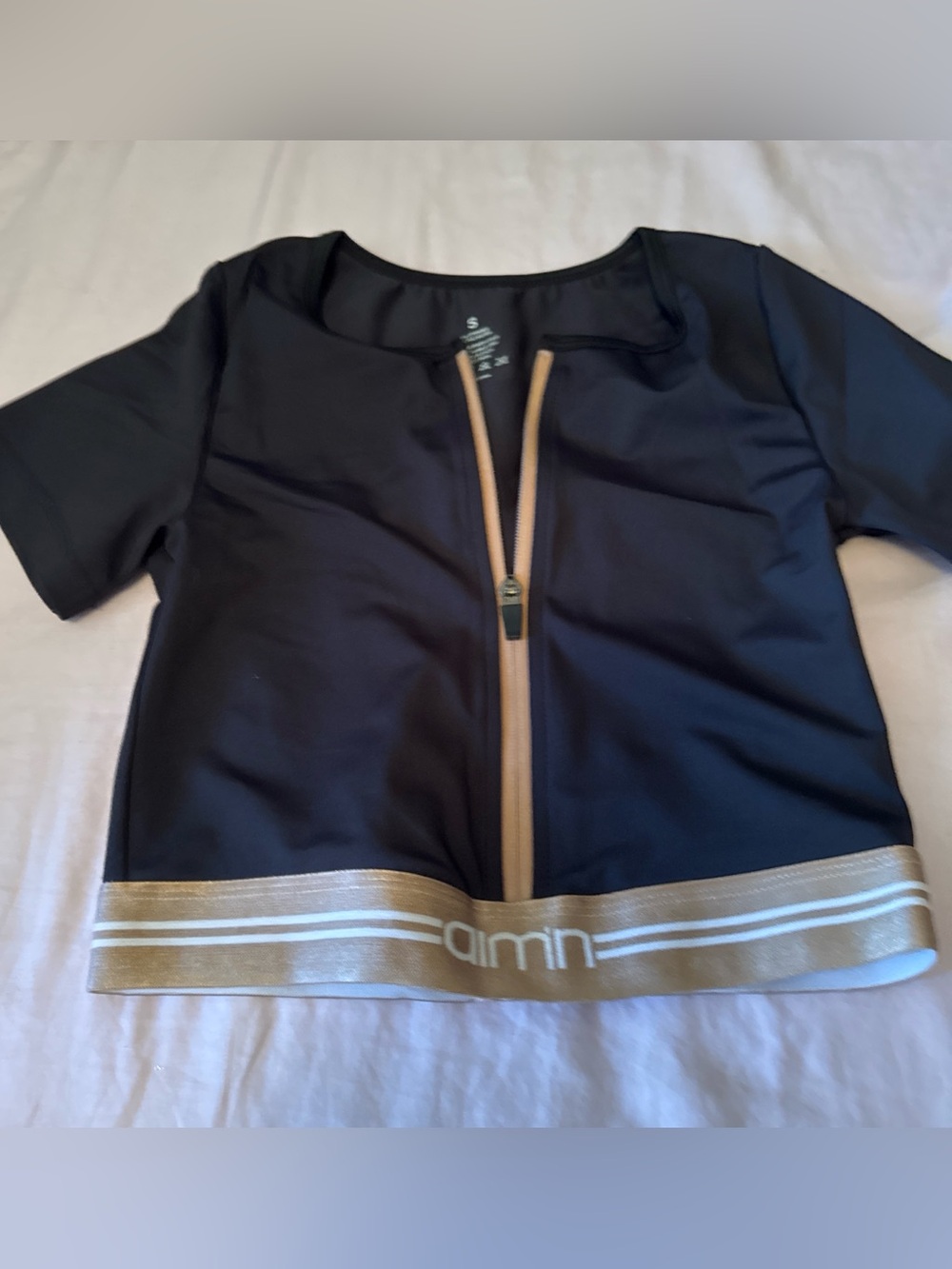 Women's Black Crop Top with Gold Trim and Front Zip